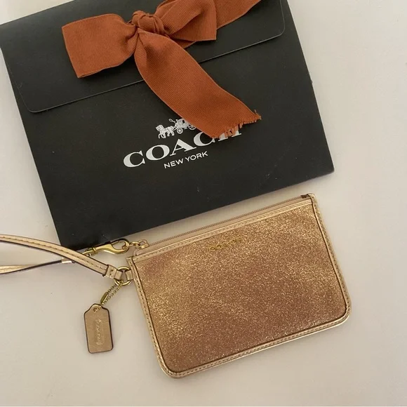 COACH GOLD GLITTER WRISTLET NWT - Picture 1 of 16